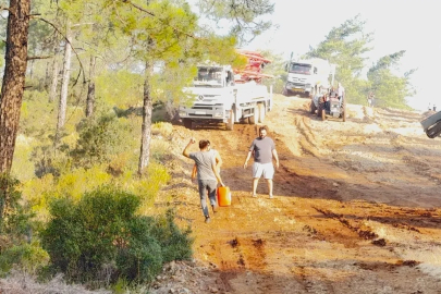 Fethiye Üzümlü’deki orman yangınında havadan ve karadan yoğun mücadele
