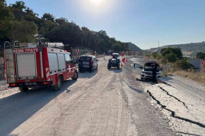 Otomobil, heyelanda yükselen asfalta çarptı
