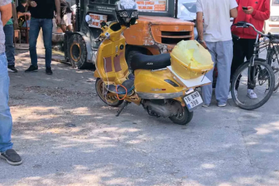 İki otomobil ile çarpışan motosiklet sürücüsü yaralandı
