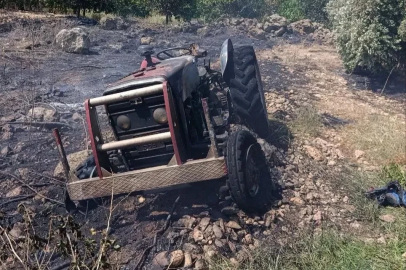 Erzin’de otluk alanda çıkan yangında alevler traktöre sıçradı

