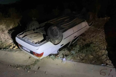 Ters dönen otomobilden sağ çıktı
